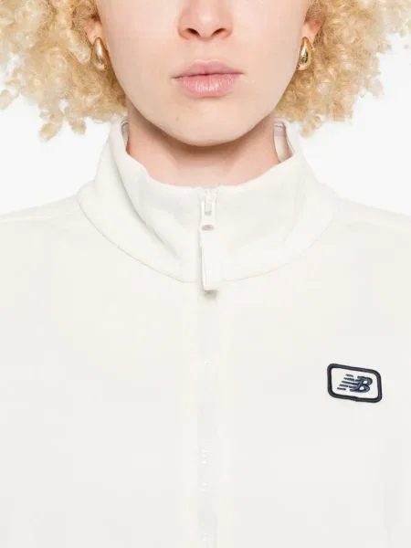 Geacă New Balance cu broderie argintiu