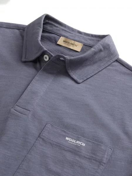 Tricou polo Woolrich din jerseu albastru