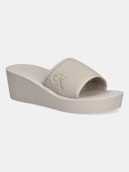 Calvin Klein Jeans klapki BEACH WEDGE SLIDE CANVAS na koturnie beżowy