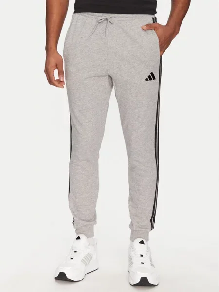Adidas Teplákové kalhoty Essential šedá