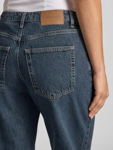 Jeansy o kroju barrel fit z czystej bawełny z szlufkami na pasek Topshop niebieskie