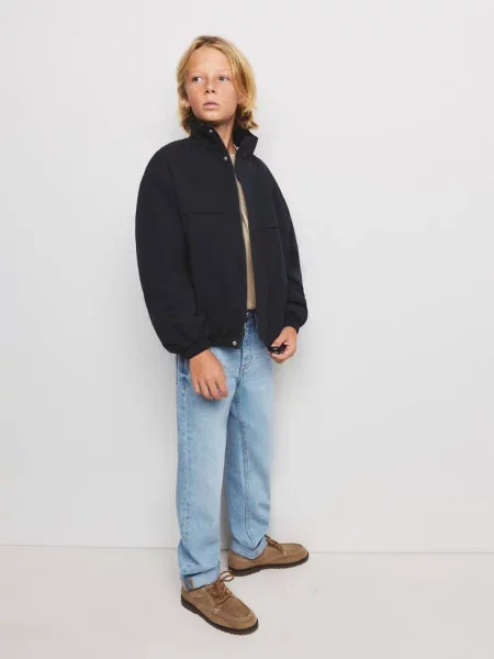 Jeansy regular fit z wywiniętymi nogawkami jasnoniebieski Dzieci 7 MANGO KIDS