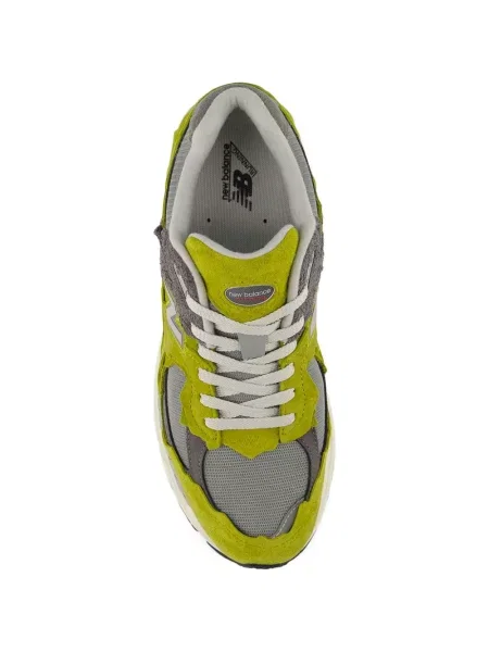 Pantaloni New Balance alergare cu autograf cu dungi roz