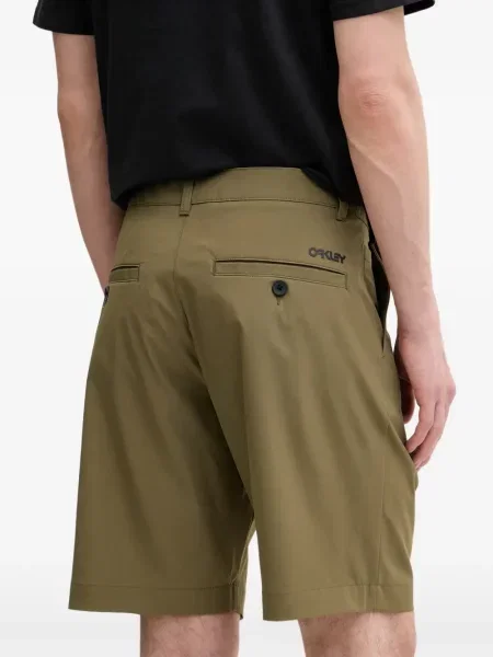 Pantaloni chino Oakley cu imagine verde