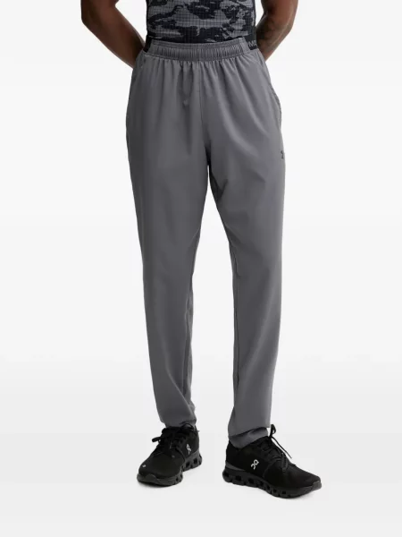 Pantaloni Under Armour cu imagine alergare gri