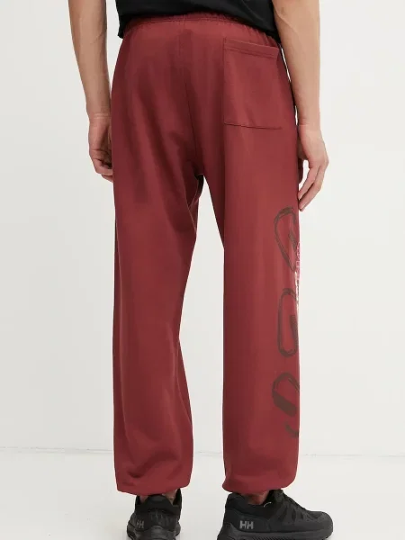 The North Face spodnie dresowe TNF X NSE czerwone