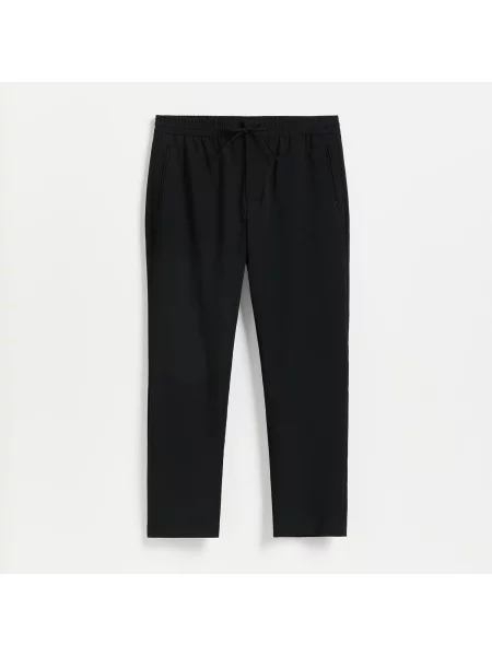 Reserved Kalhoty joggers černý