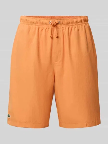 Szorty o kroju relaxed fit Sport z wyhaftowanym logo Lacoste Sport pomarańczowe