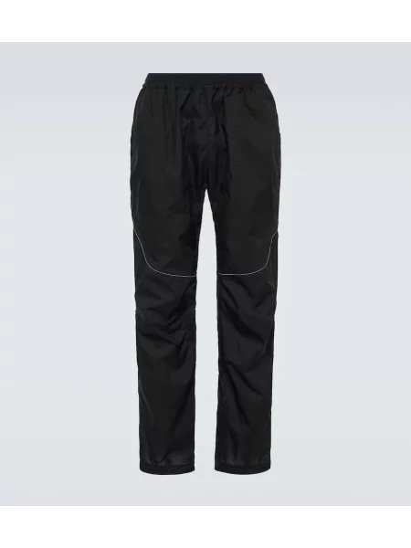 Hlače z ravnimi hlačnicami And Wander črna