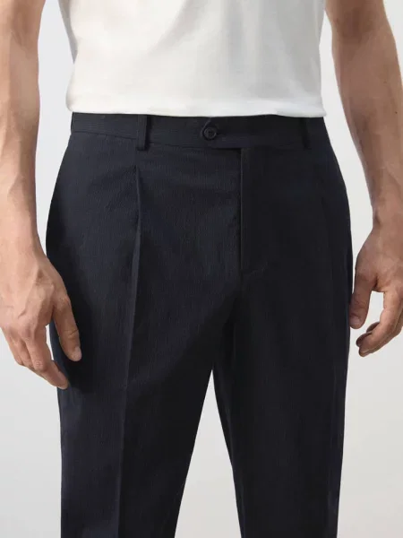 Spodnie slim fit z kory z bawełny i lyocellu Mężczyzna 38 MANGO MAN granatowy