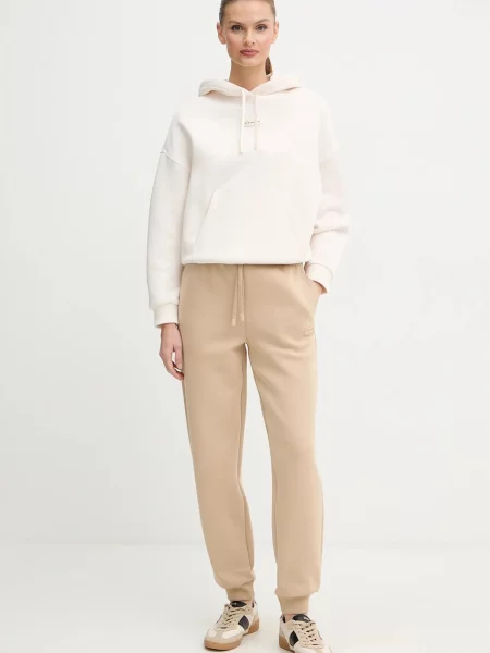 Спортивні штани Armani Exchange однотонні бежевий