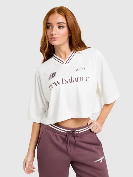 New Balance T-Shirt Cropped Sports Jersey beżowa