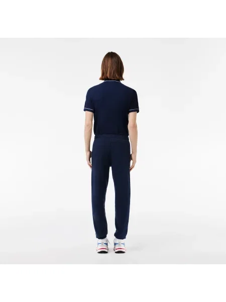 Lacoste Spodnie Dresowe O Zwężanym Kroju Z Nadrukiem granatowy