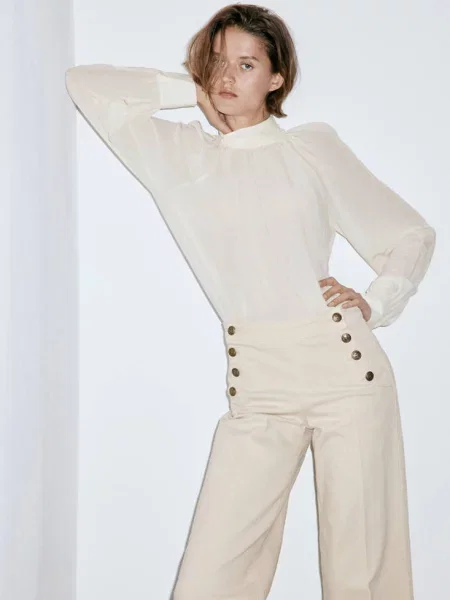 Jeansy wide leg z bocznymi piaskowy Kobieta 44 MANGO