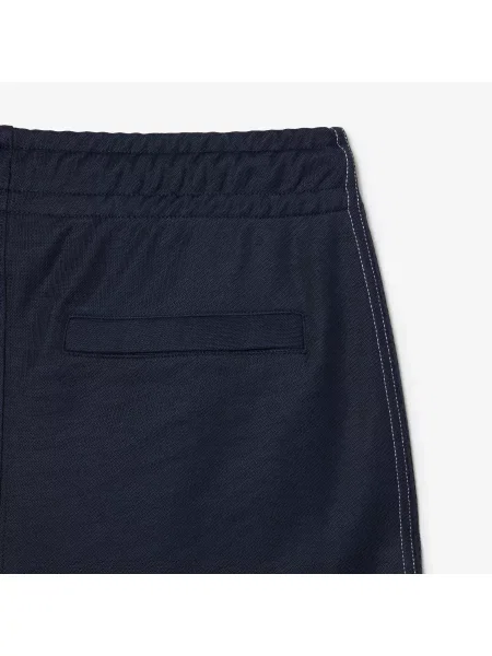 Lacoste Spodnie Dresowe O Regularnym Kroju Piqué niebieskie