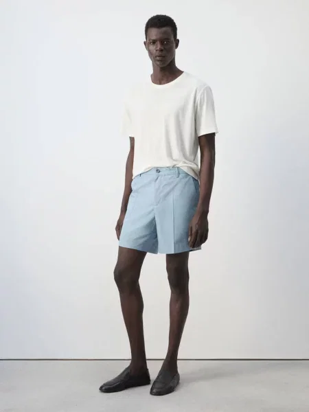 Bermudy slim fit z bawełny i lyocellu bladozielony Mężczyzna 38 MANGO MAN