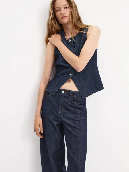 Jeansy wide leg z efektem sprania Kobieta 50 MANGO niebieski