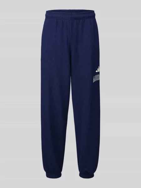 Spodnie dresowe z nadrukiem z logo Adidas Sportswear granatowe