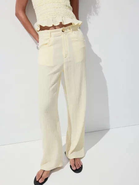 MANGO Pantaloni BORA pastel galben