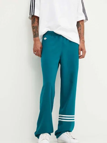 Спортен панталон adidas Originals Neuclassics тюркоазено с апликация