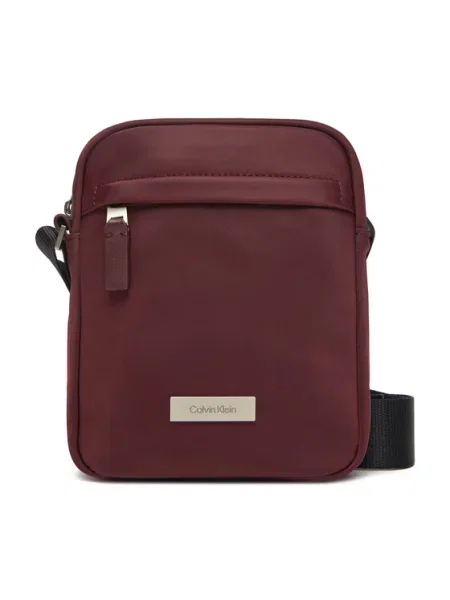 Geantă crossover Calvin Klein Sleek Reporter Vișiniu bordo