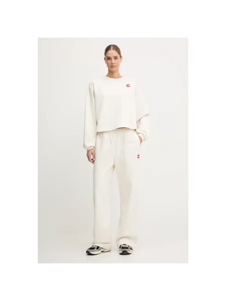 Spodnie dresowe The North Face Redbox Sweatpants White Dune L beżowe