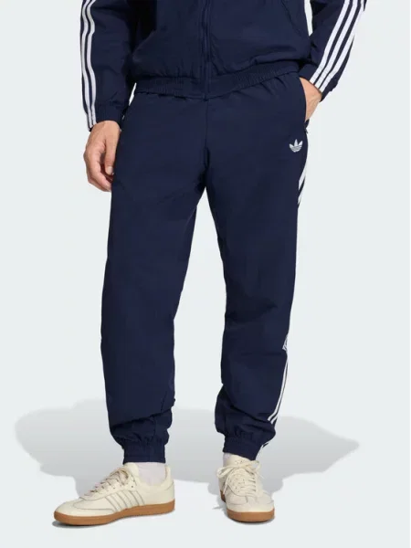 Adidas Sportinės kelnės FIREBIRD WOVEN Žydra mėlyna
