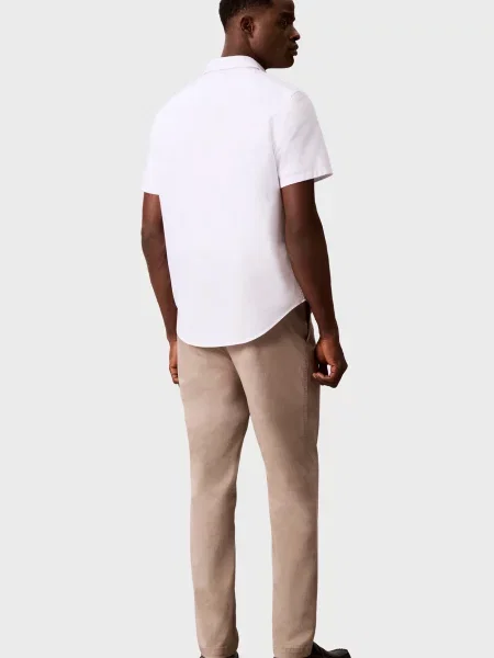 Завужені штани Calvin Klein Jeans бежеві