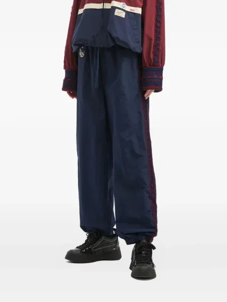 Spodnie Sea o krotszym kroju niebieskie