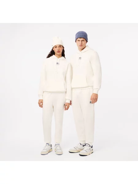 Lacoste Spodnie Dresowe Ze Zwężanymi Nogawkami niebieskie