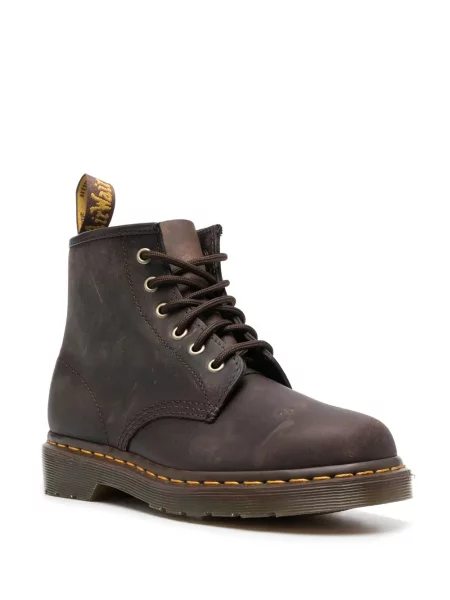Nėriniuotos auliniai batai Dr. Martens su raišteliais ruda