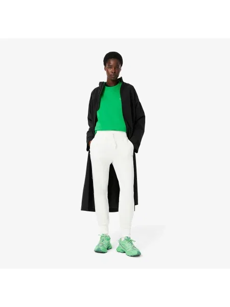Зауженные спортивные штаны Lacoste белые