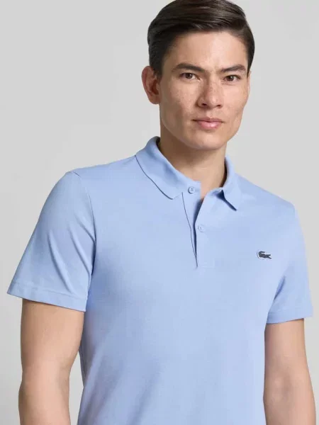 Koszulka polo o kroju regular fit z mieszanki bawełny Lacoste