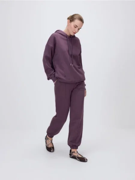 Reserved Спортивні штани з відстрочкою темно-фіолетовий фіолетові
