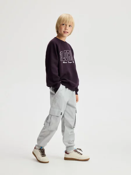 Reserved Kalhoty jogger s světle šedá