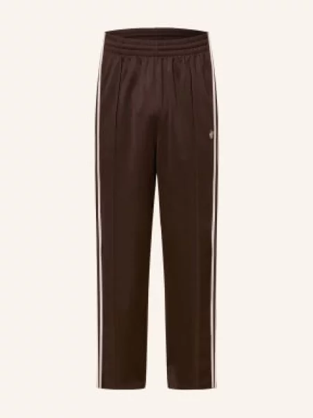 Adidas Originals Spodnie Dresowe Baggy Z Galonowymi Paskami lila różowy