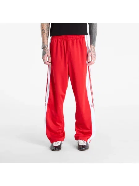Teplákové nohavice Adidas Originals červená