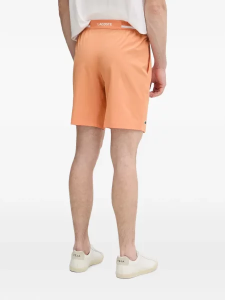 Pantaloni scurți Lacoste portocaliu