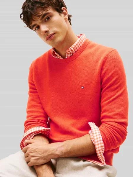 Sweter z dzianiny o kroju regular fit z czystej bawełny Tommy Hilfiger pomarańczowy