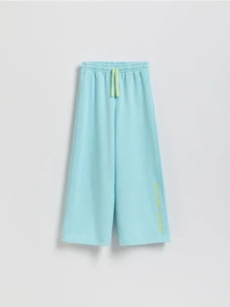 Reserved Спортивні штани з принтом світло-бірюзовий бірюзовий