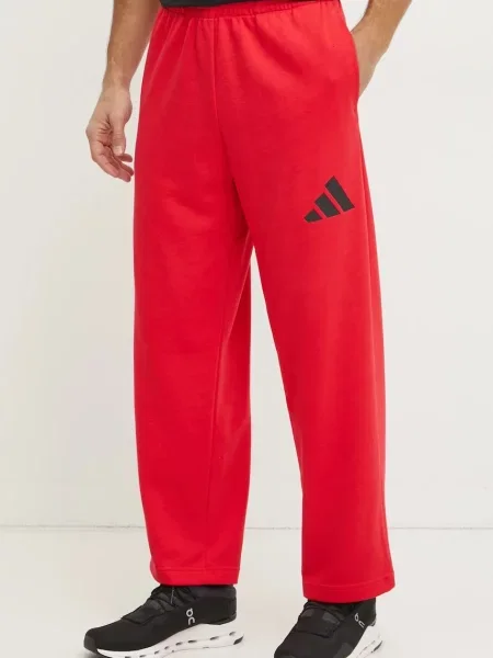 Спортен панталон adidas Essentials с изчистен дизайн червено