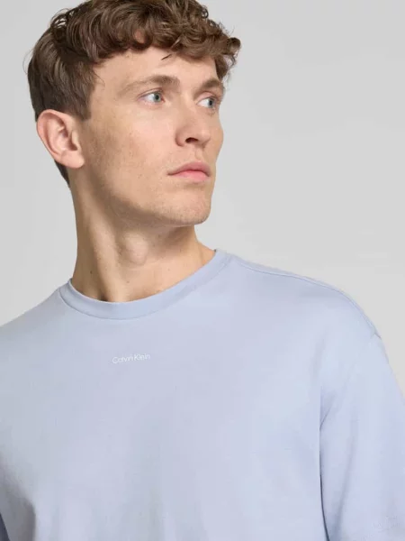 T-shirt z nadrukiem z logo model ‘NANO’ Calvin Klein niebieska
