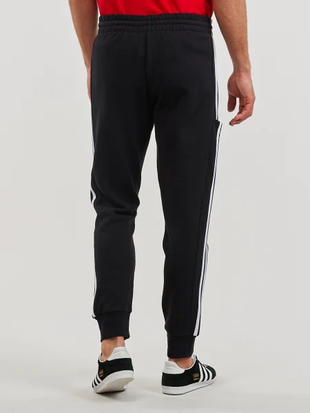 Csíkos frottír melegítőnadrág Adidas Sportswear fekete
