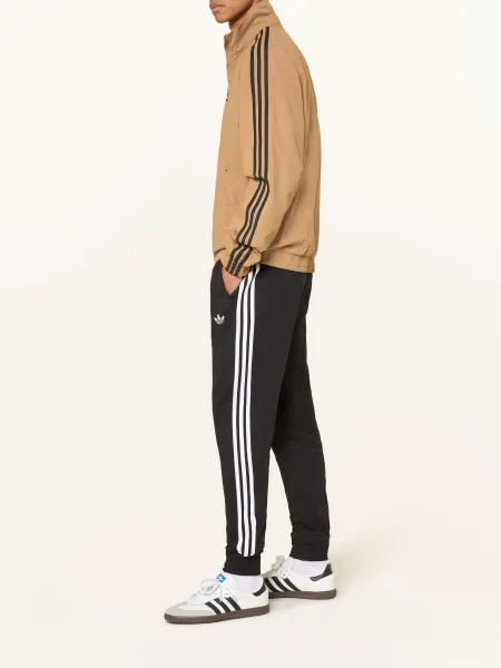 Teplákové kalhoty adidas černé