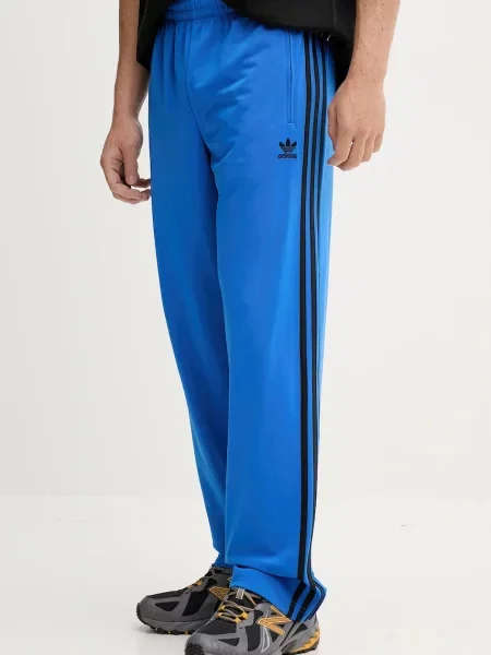 Tepláky adidas Originals Firebird s aplikací modrá