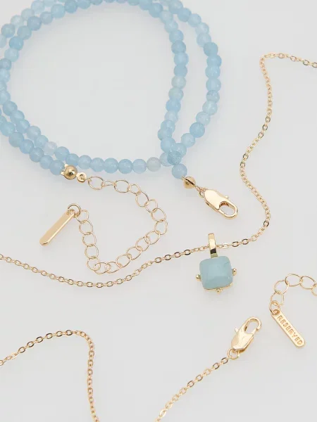 Подвеска Reserved с камнями голубая