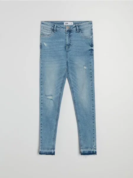 Джинси skinny з ефектом виварювання синій