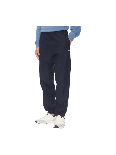 Spodnie dresowe Calvin Klein Jeans frotte niebieskie