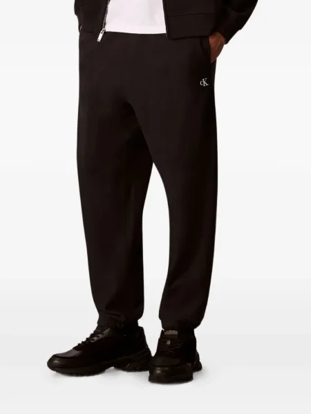 Pantaloni Calvin Klein Jeans alergare cu autograf negru