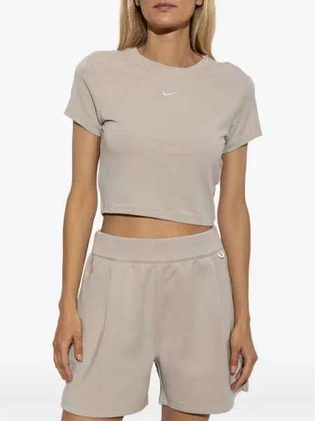 Decupat pantaloni scurți Nike cu broderie plasă roz